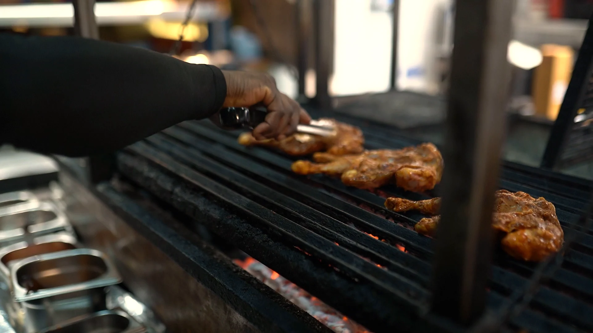 Dishes cooking over the charcoal grill at Monika