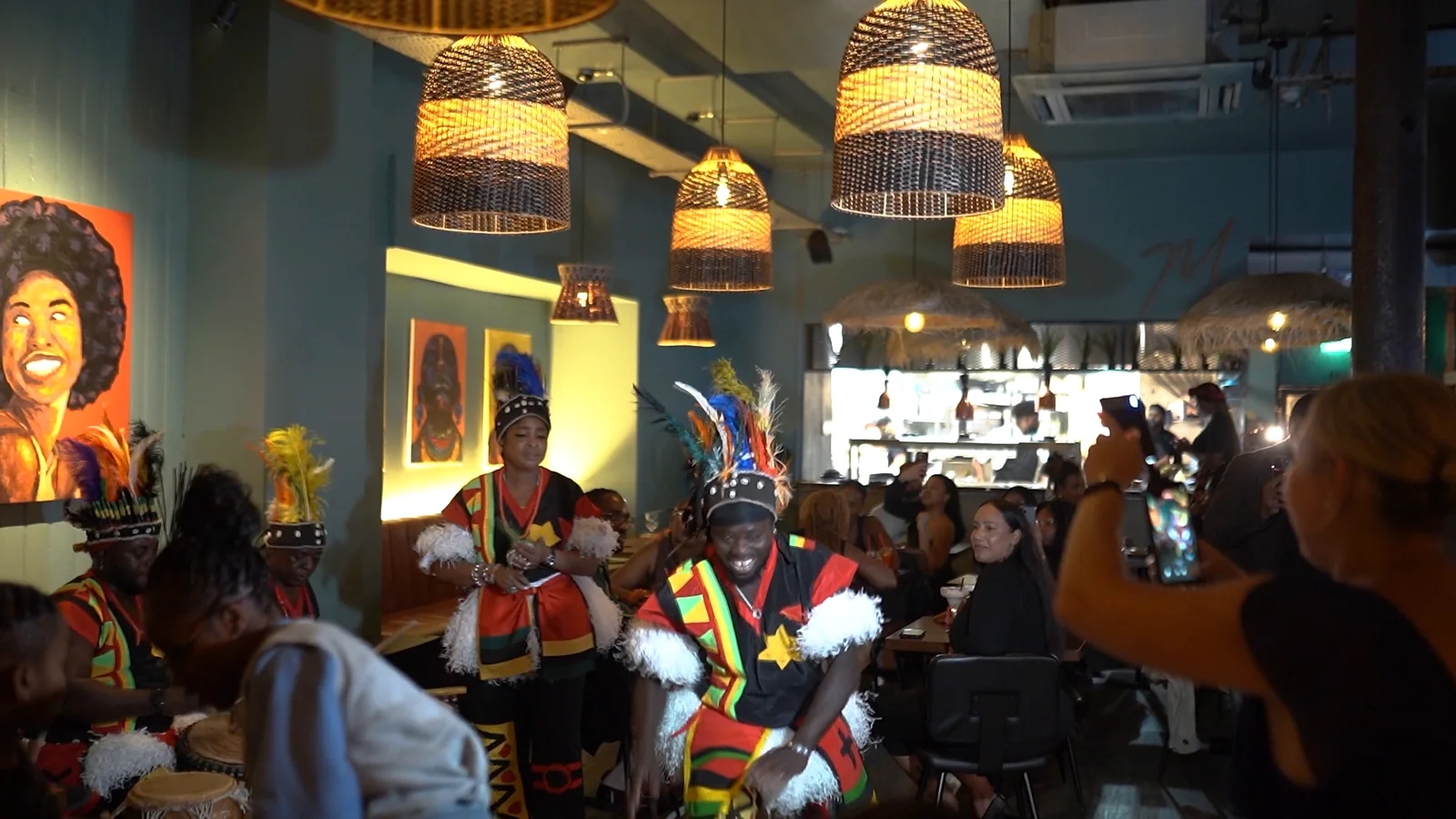 Performer dancing among guests at Monika Restaurant
