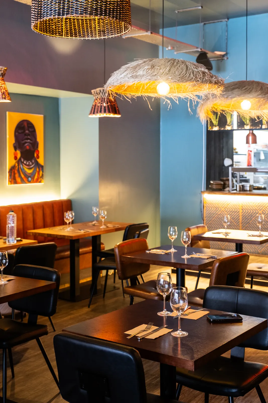 Warm lighting over the Monika dining tables